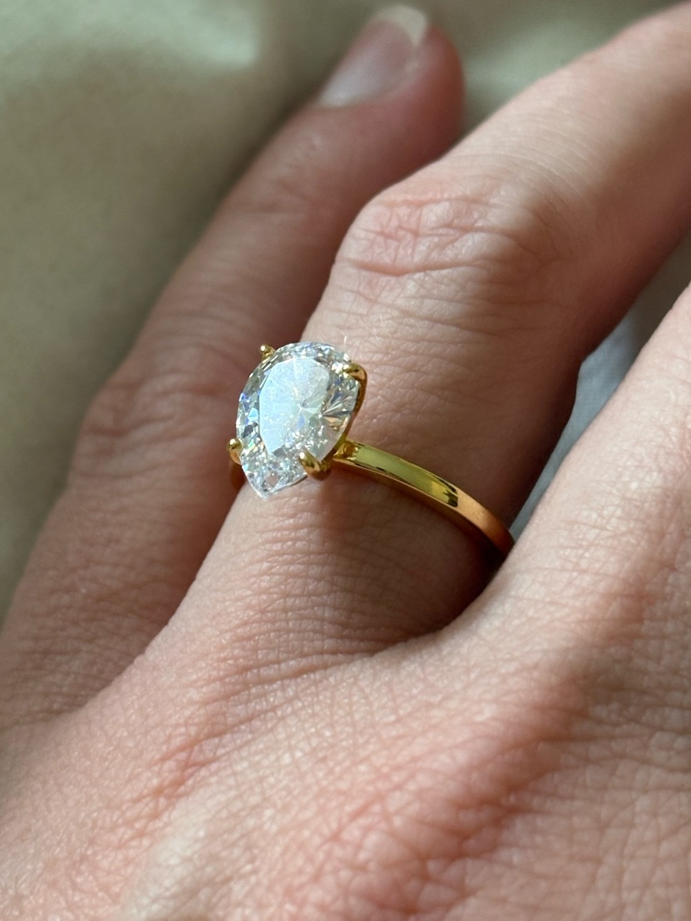 Gold Pear-Cut Solitaire Ring with Clear Stone - Women's Jewelry